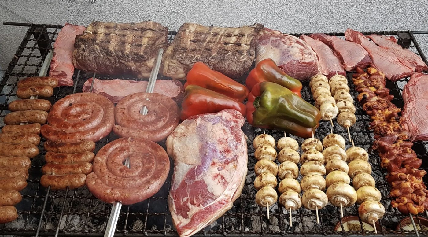 Grill loaded with meats and vegetables
