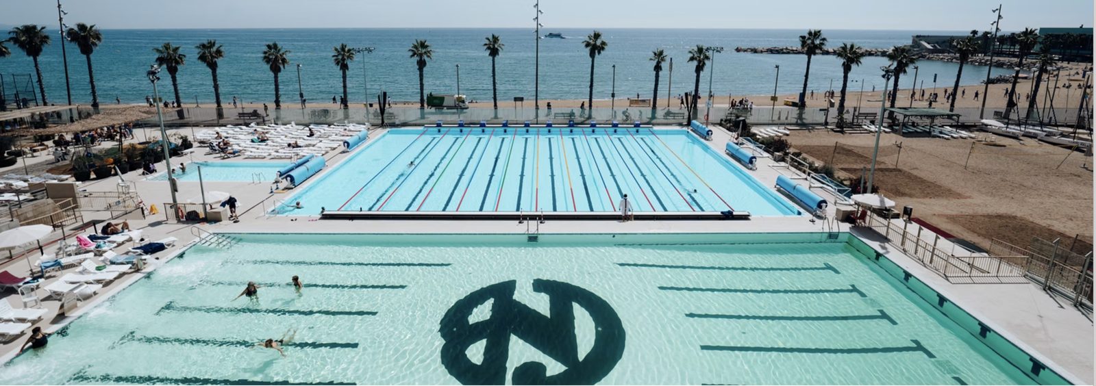 Club Natació Barcelona — pools, palms and the Mediterranean