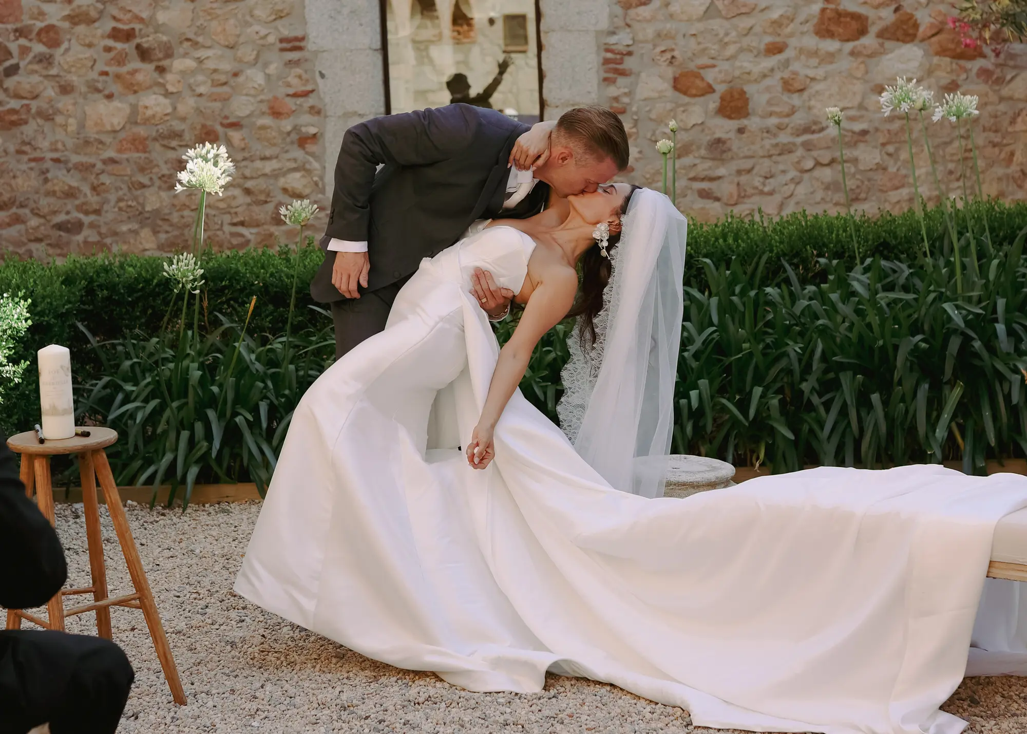 Joe dips Gabrielle for a kiss in the cloister