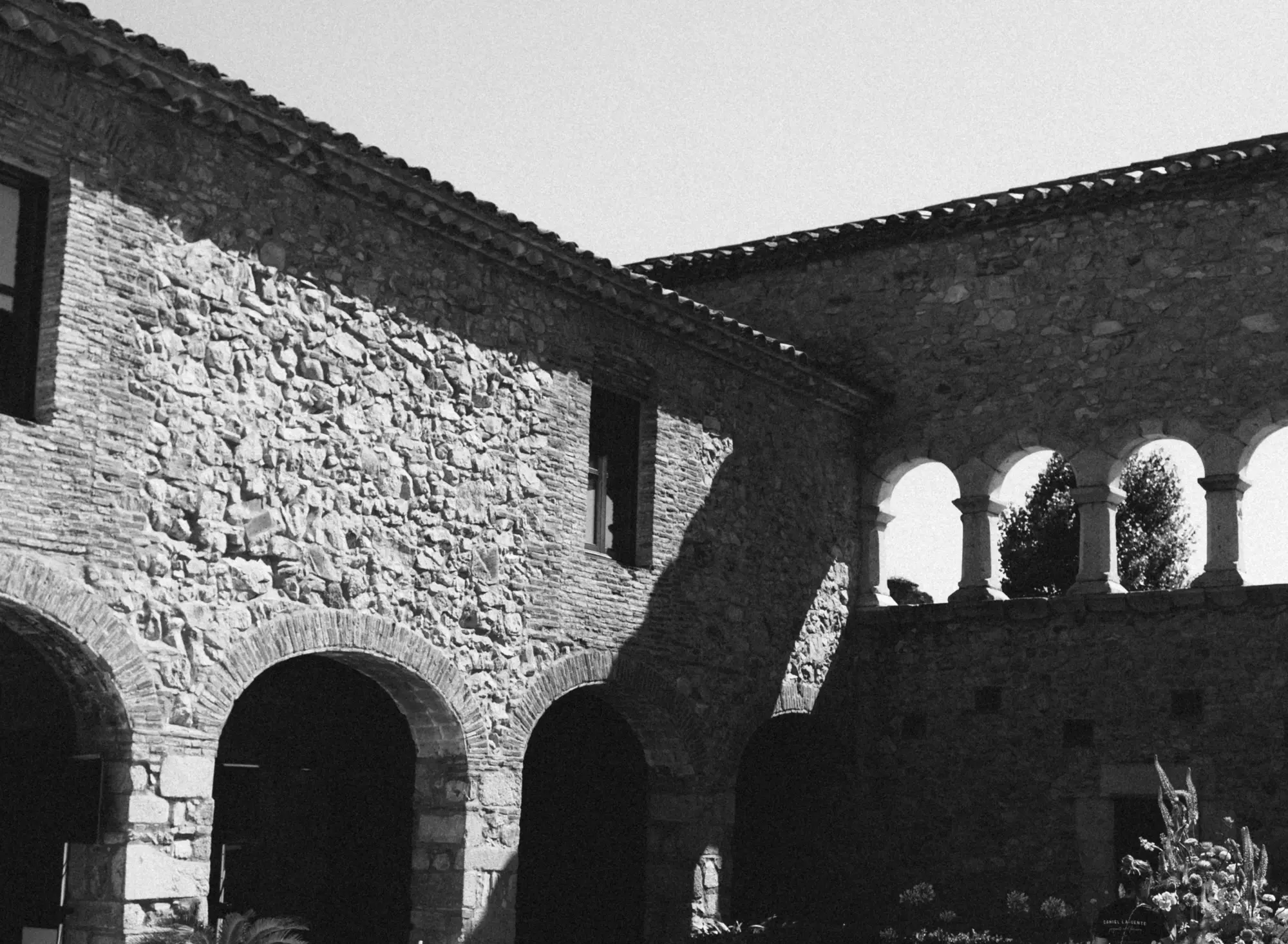 The upper and lower archways of the cloister at Monestir de Sant Salvi