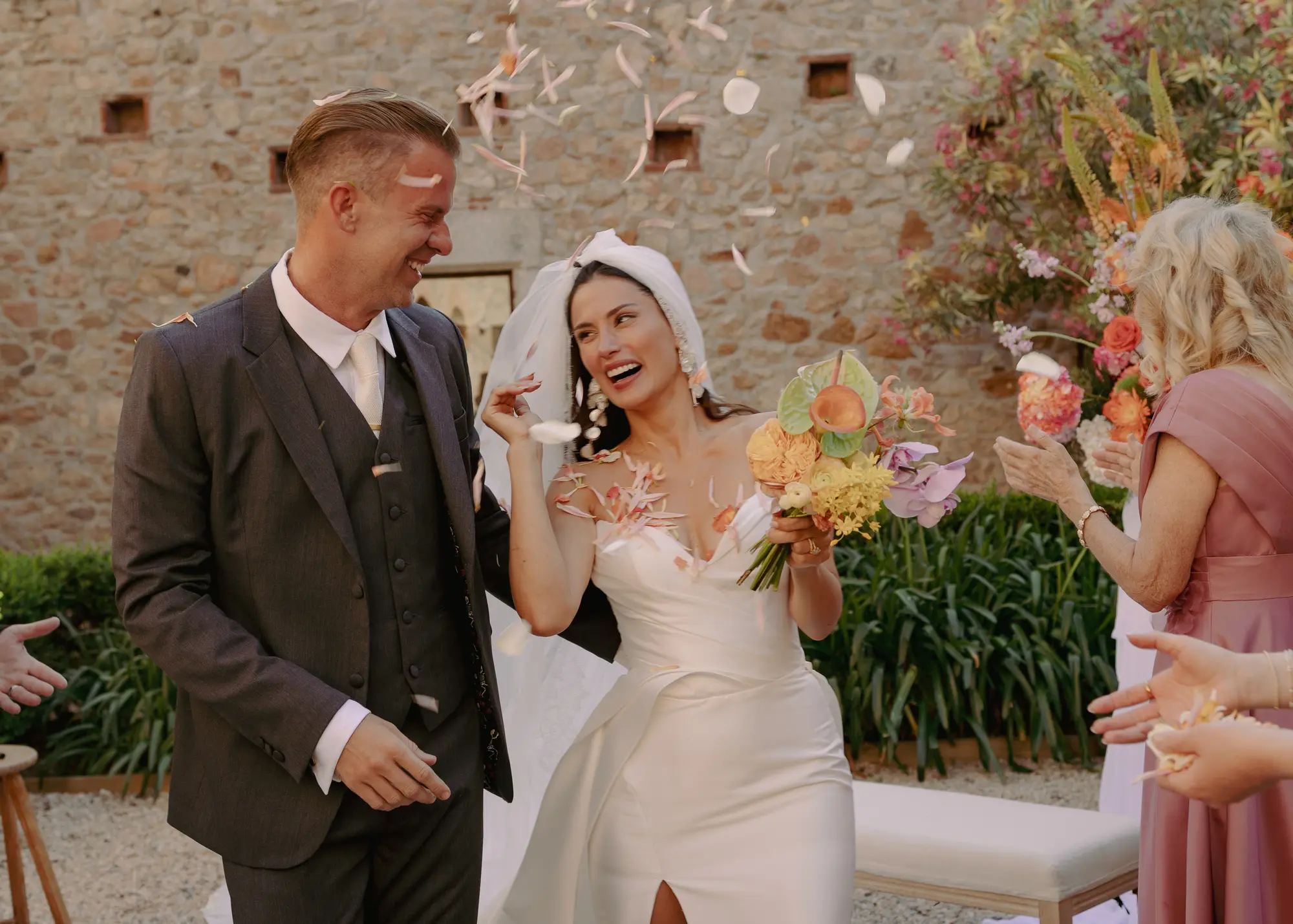 Gabrielle and Joe walking out after the ceremony